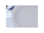 Close-up of the white tray rim showing the smooth rounded edge.