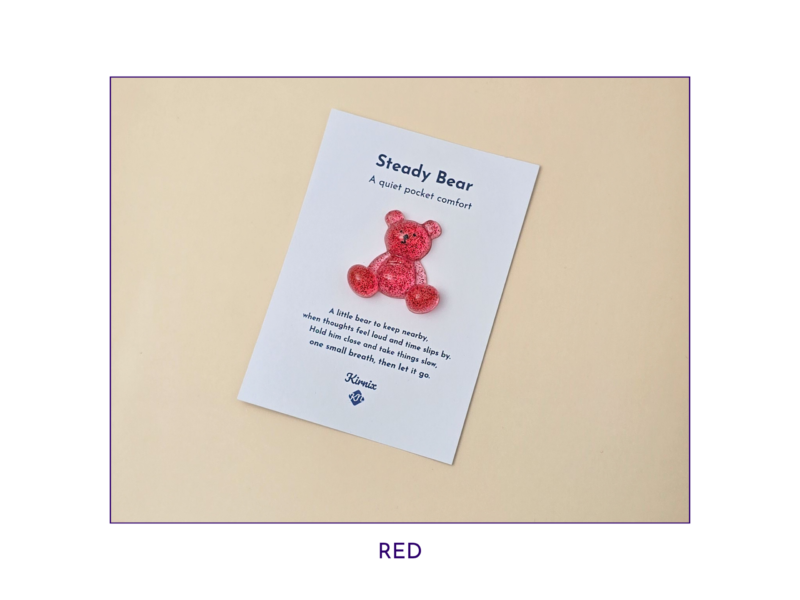 Steady Bear glitter pocket companion in red on its printed support card.