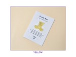 Steady Bear glitter pocket companion in yellow on its printed support card.