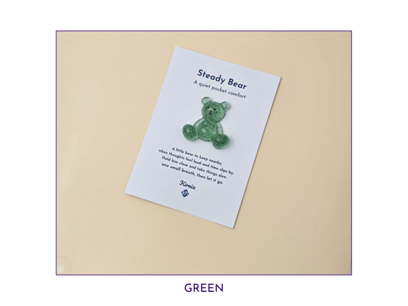Steady Bear glitter pocket companion in green on its printed support card.