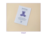 Steady Bear glitter pocket companion in violet on its printed support card.
