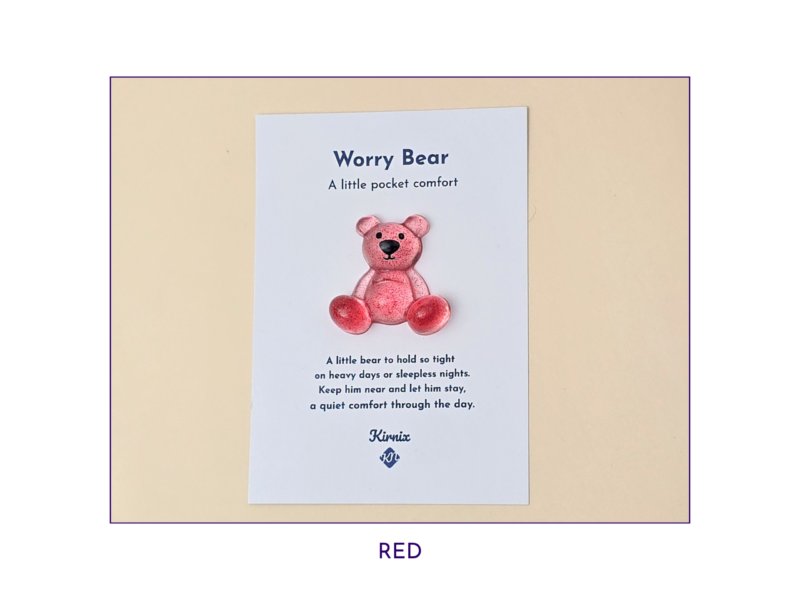 Red Worry Bear pocket companion on backing card