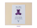 Violet Worry Bear pocket companion on backing card