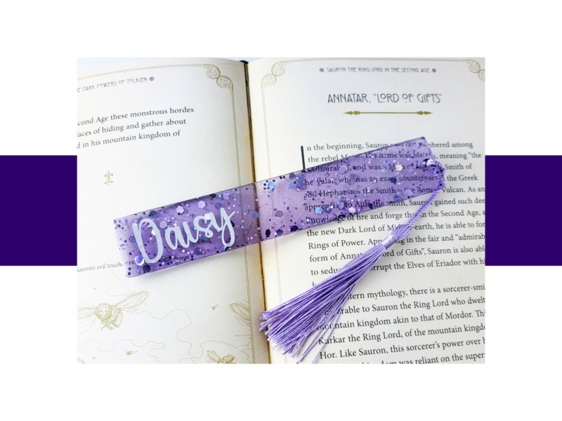 Open book showing the chapter title 'Annatar, Lord of Gifts' with a purple glitter bookmark crossing the pages.