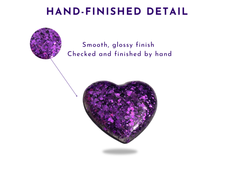 Purple glitter heart with a smooth, glossy finish on a white background, highlighting hand-finished detail.