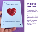 KNK-THANK YOU HUG-_078 Light blue card featuring a glittery red heart and the words 'Thank You Hug' on a purple background, a small keepsake card idea.