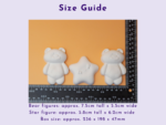 Size guide image showing white bear figures with a ruler on an orange background for scale reference.
