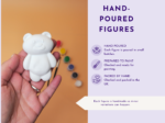 KNP-PYO-BEARS-mini_088. Handmade_detail Close-up of a hand holding a white ceramic bear figurine against an orange background, with a lavender infographic panel on the right reading 'HAND-POURED FIGURES'.