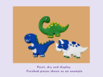 Clay dinosaur figures (green long-neck, blue tyrannosaurus, white triceratops) arranged on a peach display board, part of a finished-pieces example poster.