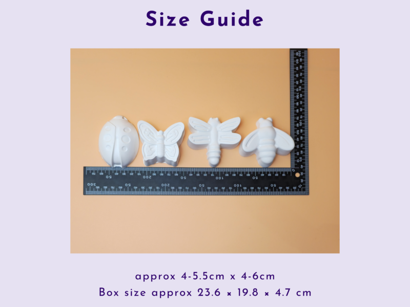 Size Guide: white butterfly shapes and a measuring ruler laid on a peach background against a purple page.
