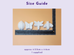 Size Guide header above white butterfly and bee charms aligned with a measuring ruler against an orange background.
