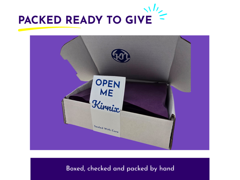 Cardboard gift box with an 'OPEN ME' card showing, purple background, and a header that reads 'Packed Ready to Give'
