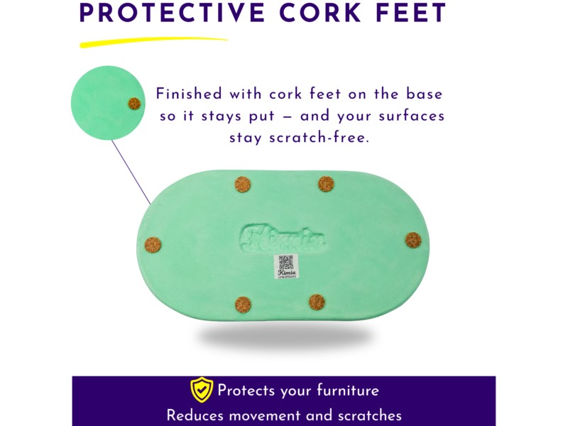 Teal round/platform with cork feet attached, floating above a white background and purple text that says 'PROTECTIVE CORK FEET'.