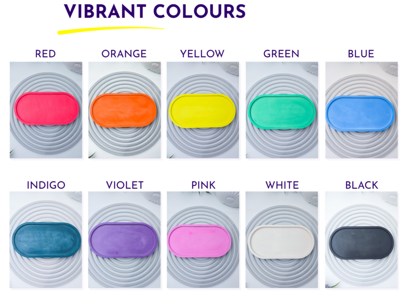 Gallery of vibrant silicone trays in red, orange, yellow, green, blue with corresponding color labels over a spiraled background.