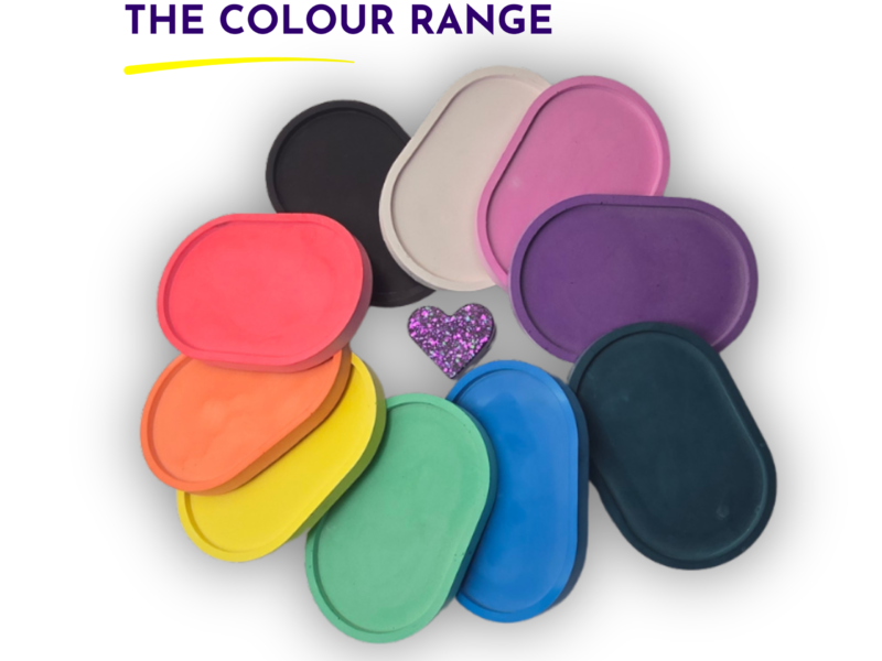 Assorted overlapping circular color swatches in rainbow hues arranged in a cluster against a white background.