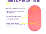 Promotional graphic for a pink handheld product with yellow callouts highlighting features like hand-poured AquaCast eco resin and a smooth sealed surface.