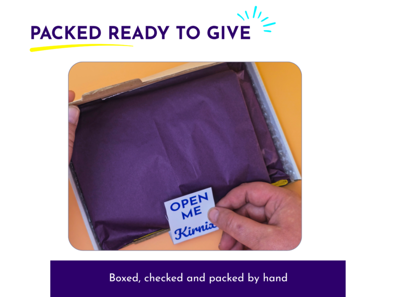 Brick Buddy craft kit packed in a box with purple tissue, showing how the handmade kit is presented before dispatch.
